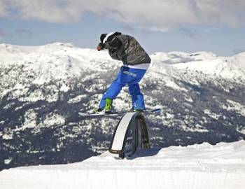 Snowboarder on Rail in the Nintendo Terrain Park on Blackcomb Mountain Whistler events